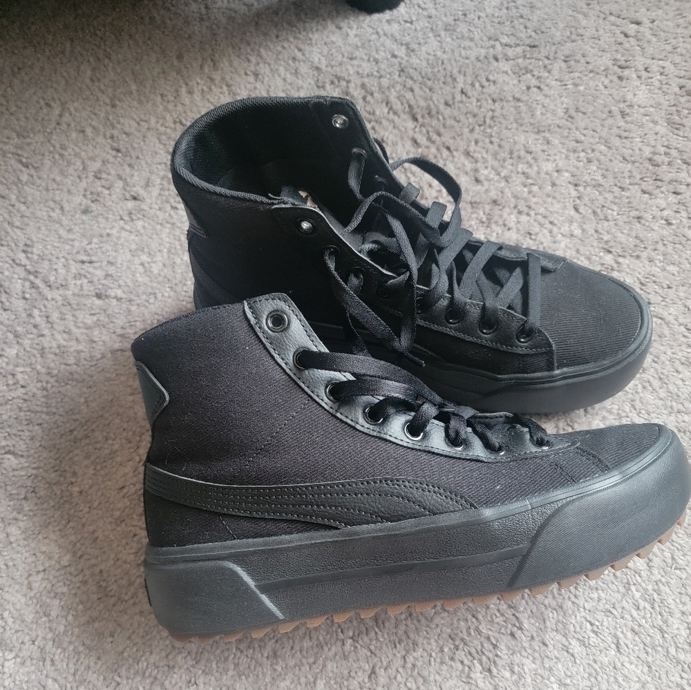 Women's Puma Kaia Black High-Top Sneakers with Canvas Upper. They run a bit wide
